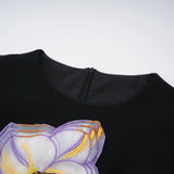 Irène sequined floralembroidered midi dress in Black