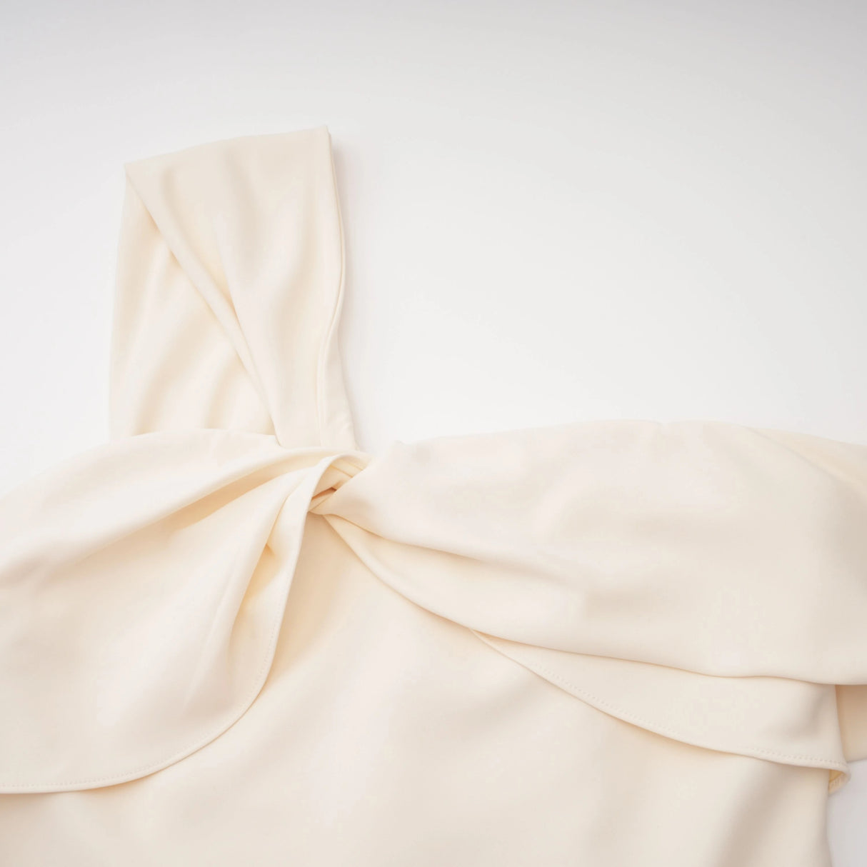 Ismérie Neutrals OffShoulder Twisted Mini Dress