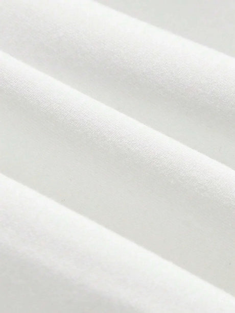 A soft, luxurious white dress crafted from a breathable cotton blend features a flattering fitted silhouette that gently.