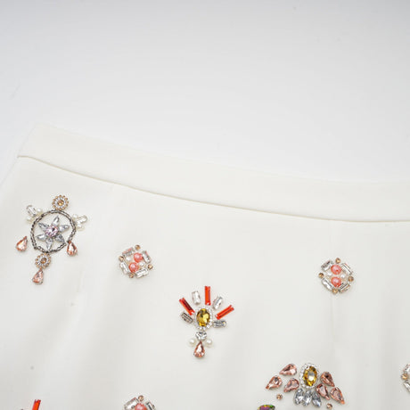 Jeanne white crystalembellished top  skirt matching set