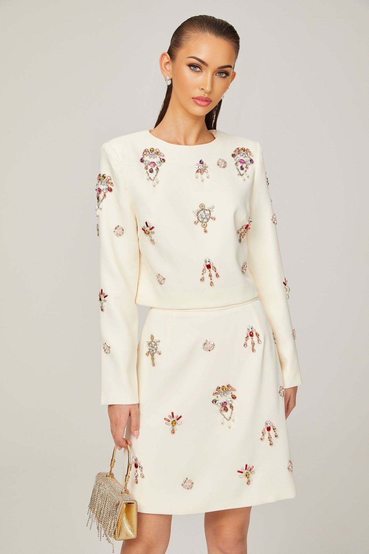 Jeanne white crystalembellished top  skirt matching set