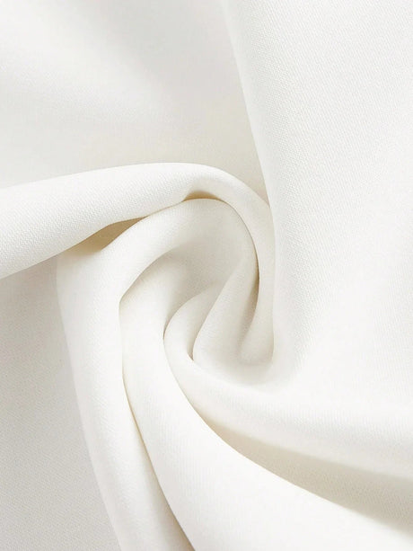 This elegant white dress features a smooth, lightweight fabric that drapes beautifully, creating a flattering silhouette..
