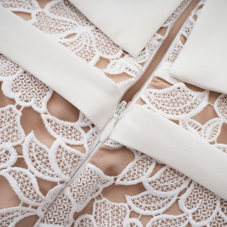 Jorvilda white pierced midi dress