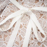 Jorvilda white pierced midi dress