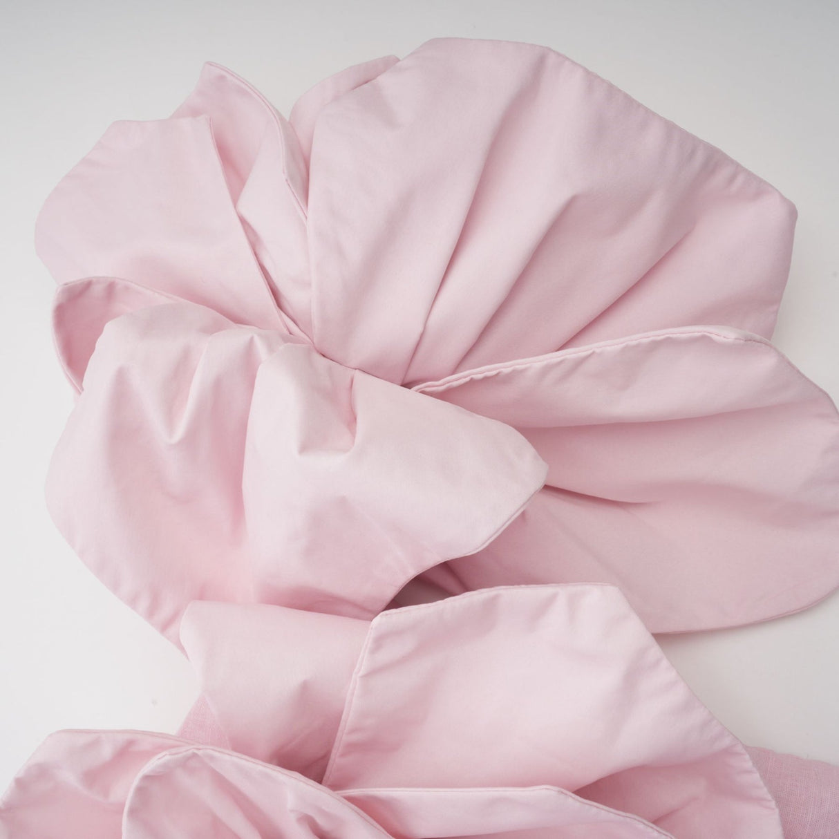 Juliette pink mini dress with offshoulder neckline and three dimensional petal details