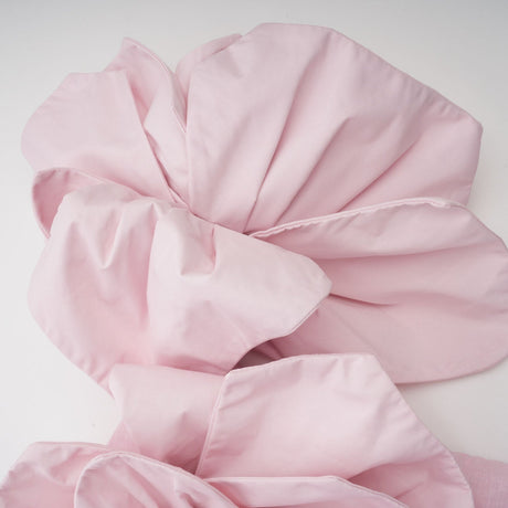 Juliette pink mini dress with offshoulder neckline and three dimensional petal details