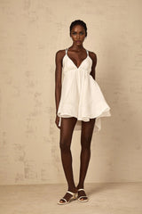 Karina Mini Dress White Shirred Flounce V - Neck Sleeveless Tie - Back & Thigh - Length