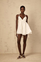 Karina Mini Dress White Shirred Flounce V - Neck Sleeveless Tie - Back & Thigh - Length