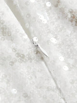 Featuring a dazzling white design adorned with shimmering sequins, this elegant dress offers a figure-flattering fit perfect.