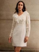 This elegant white dress features a fitted silhouette with delicate ruffled detailing around the neckline and long sheer.