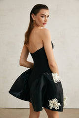 Léonor black floralappliqué peplum mini dress