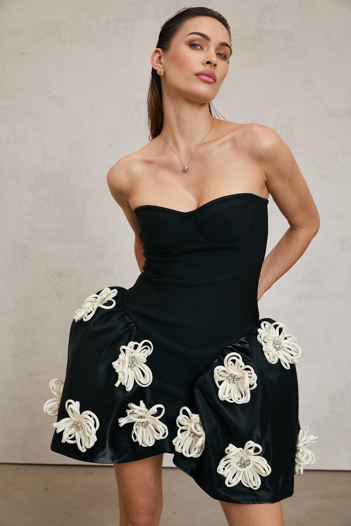 Léonor black floralappliqué peplum mini dress