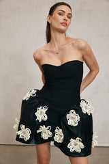 Léonor black floralappliqué peplum mini dress