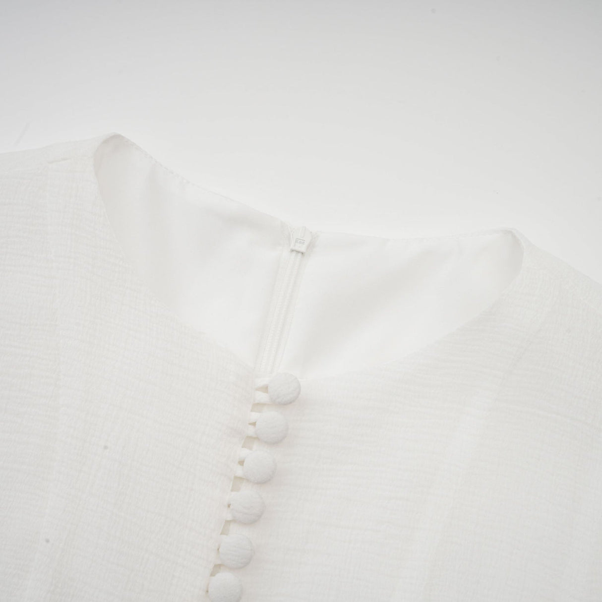 Letizia Mini Dress White Flared Sleeves Sheer Button Hem