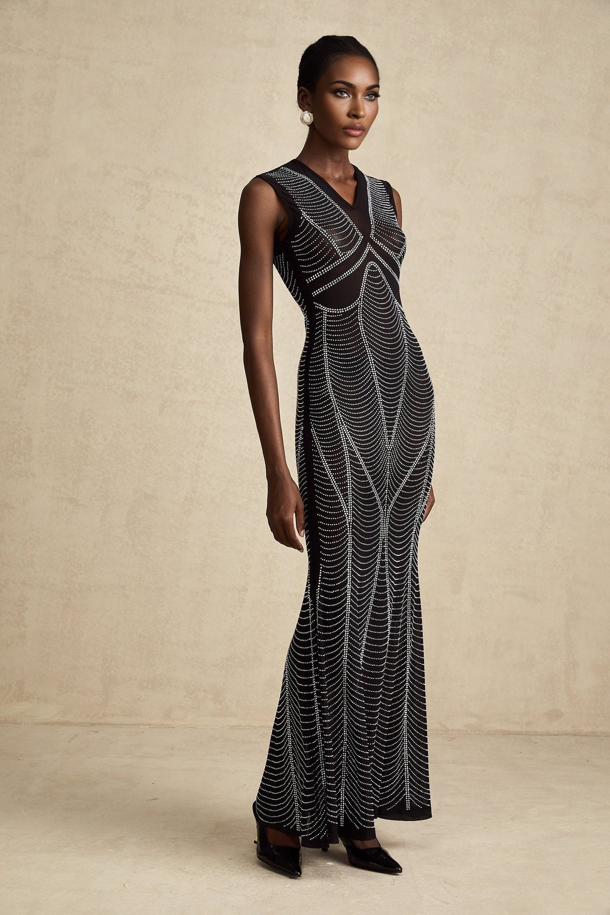 Liane black crystalembellished semisheer maxi dress