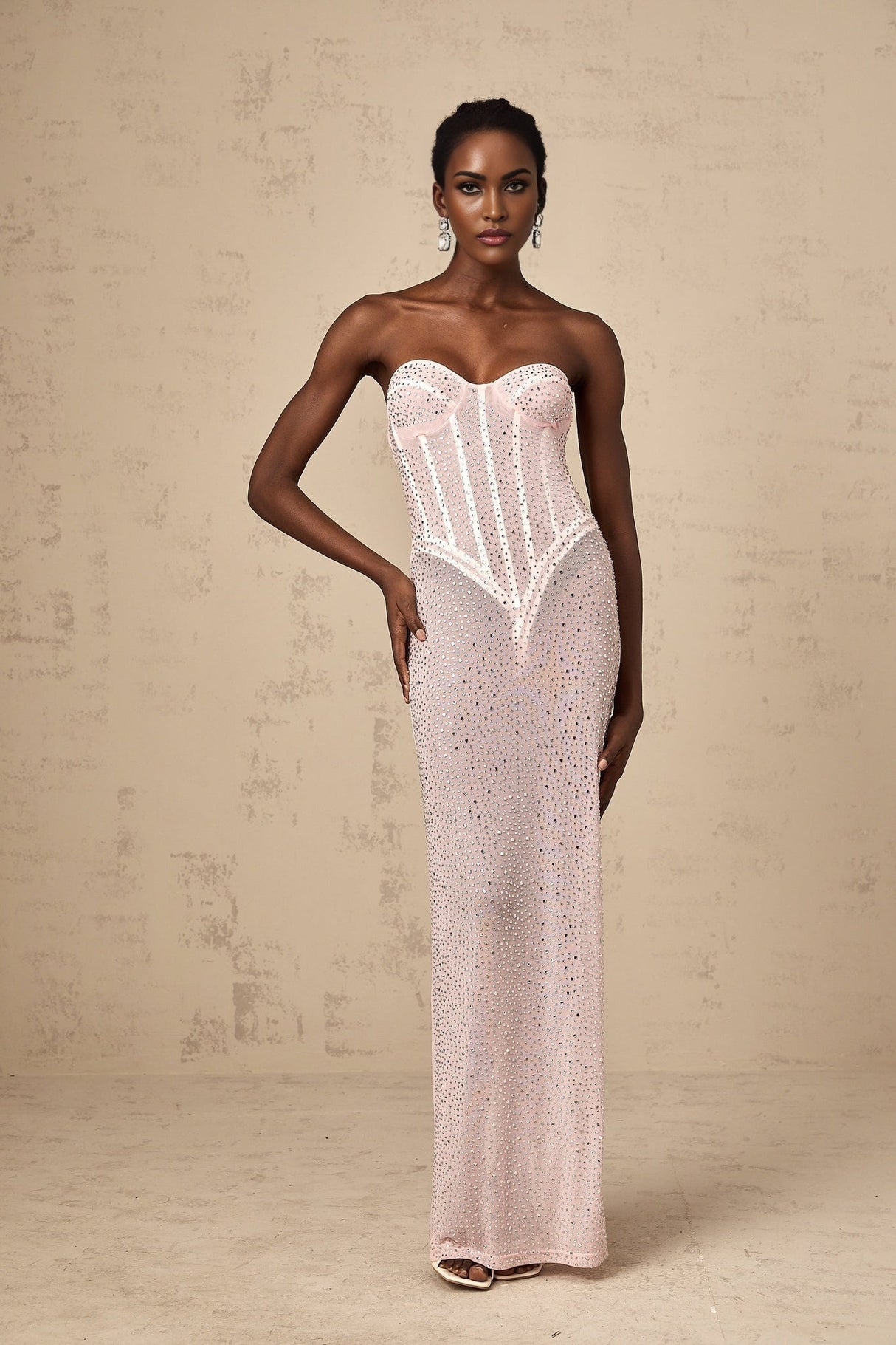 Long pink maxi dress with rhinestone embellishments and semi sheer fabric