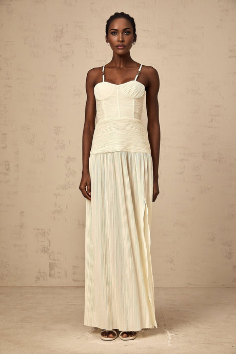 Long pleated maxi dress in neutral tones with side slit detail