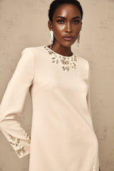 Long sleeved neutral mini dress with crystal embellishments called Melissa