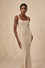 Long white maxi dress with crystal embellishments and open back design