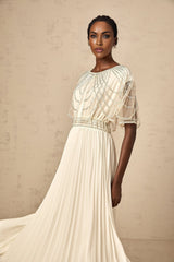 Long white pleated maxi dress with crystal embellishments named Xenia