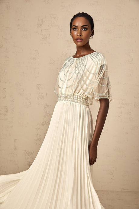 Long white pleated maxi dress with crystal embellishments named Xenia