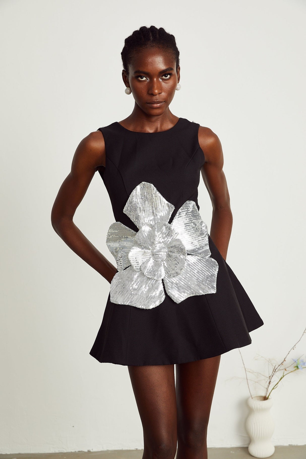Maëlys black floralappliqué sleeveless mini dress