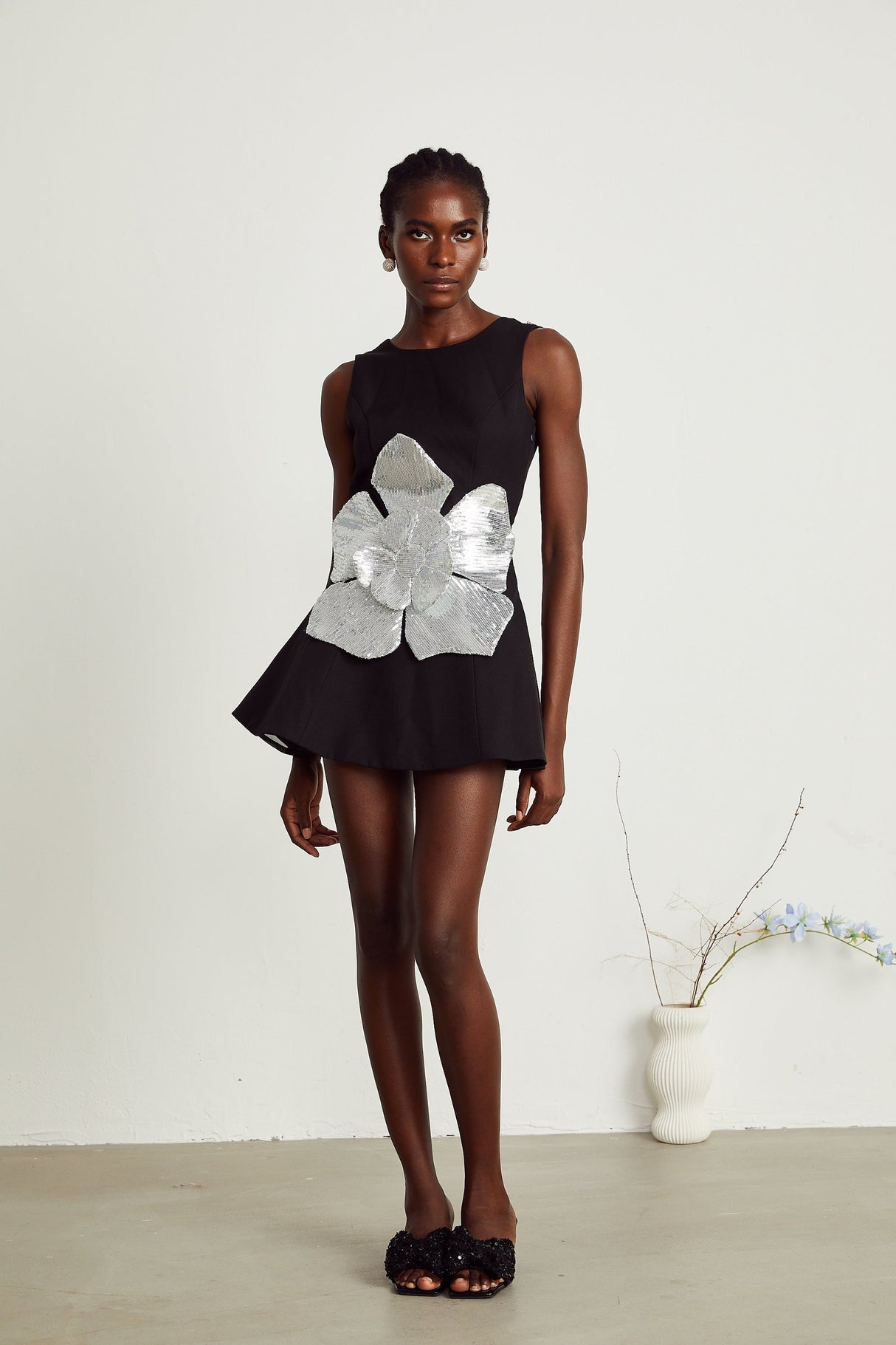 Maëlys black floralappliqué sleeveless mini dress