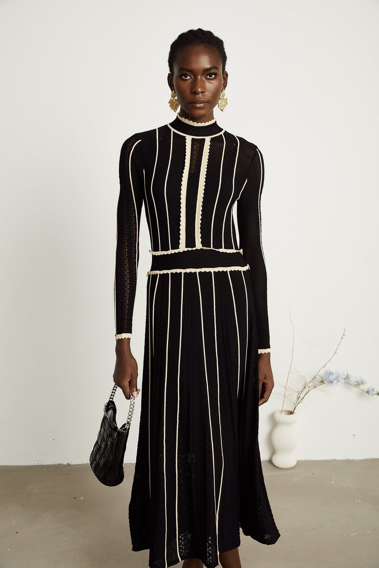 Maëlys black verticalstripe netted maxi dress