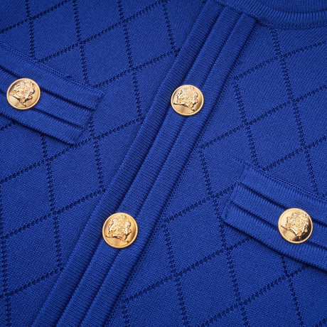 Maelys blue knitted matching set with button details on top and skirt