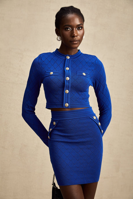 Maelys blue knitted matching set with top and skirt featuring button details