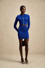 Maelys blue knitted matching set with top and skirt featuring button details