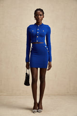 Maelys blue knitted top and skirt set with button details on both pieces