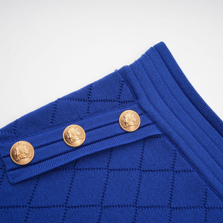 Maelys blue knitted top and skirt set with button details on both pieces