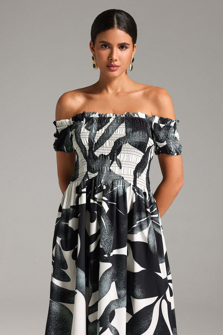 Malina Black Smocking Dress with Intricate Bodice Detailing and Flowing Fabric