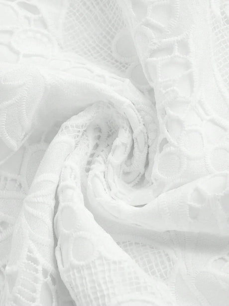 Delicate and ethereal, this white lace dress features intricate floral patterns that cascade gracefully, enhancing its.