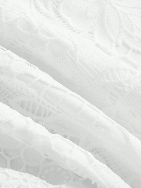 This elegant white dress features intricate lace detailing that adds a romantic touch, making it perfect for special.