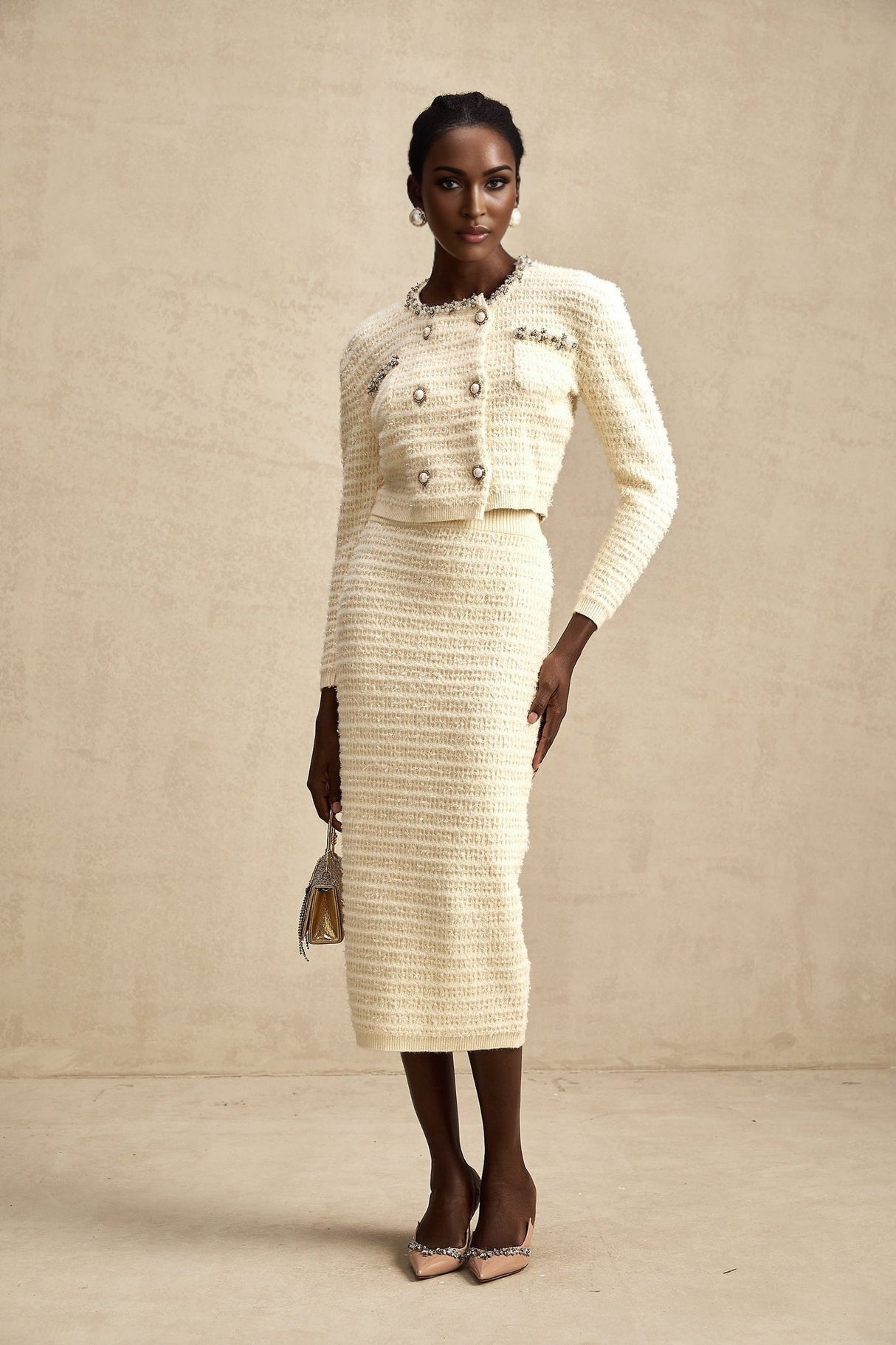 Matching knit cardigan and skirt set in light color featuring embellishments Justine style elegant womens outfit