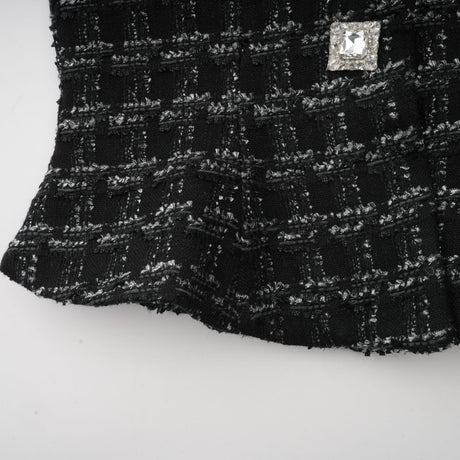 Matching set of black checked tweed vest top and skirt in Axelle style