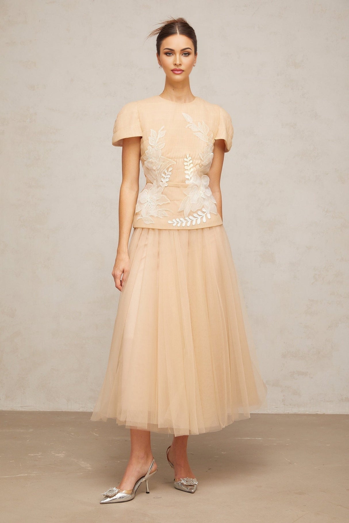 Matching set with floral tulle top and skirt featuring delicate floral appliques in a romantic and feminine design