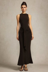 Melissa brown elegant sophisticated sleeveless dress with unique folds at waist and high neckline for formal events or gatherings