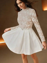 This stunning dress features a delicate lace bodice in soft beige, offering a romantic touch with its intricate floral.