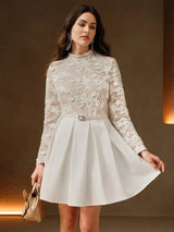 This elegant white dress features a stylishly fitted bodice adorned with intricate floral lace, complemented by long sheer.