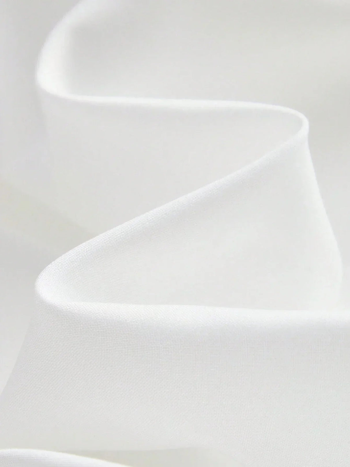 This elegant white dress features a flowing silhouette crafted from soft, lightweight fabric that drapes beautifully. Its.