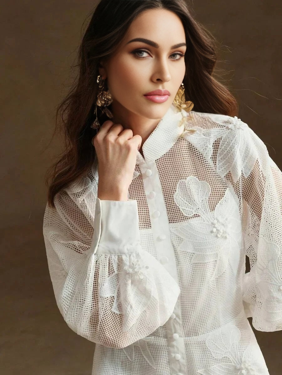 This stunning white dress features a delicate lace overlay adorned with floral patterns, accentuating its elegant and.