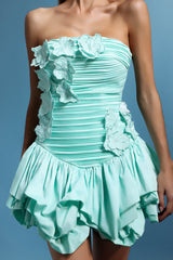 Mint strapless mini dress with ruched bodice and floral detailing
