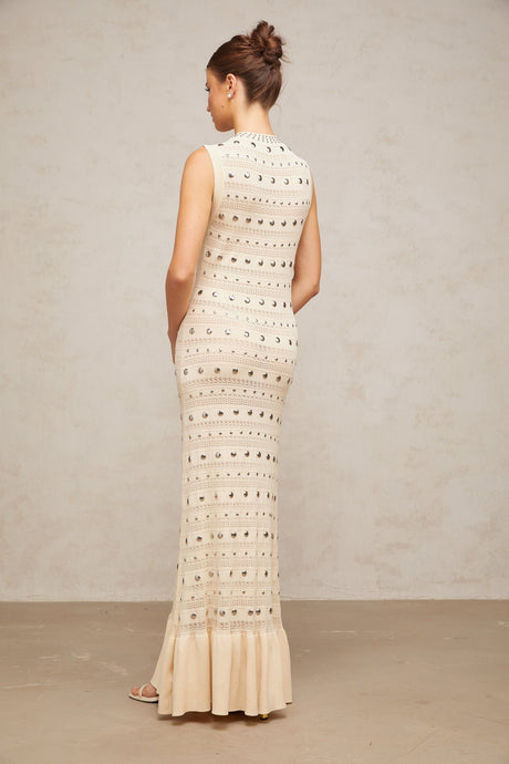 Neutral colored long crochet knit maxi dress with studded details by Chloe
