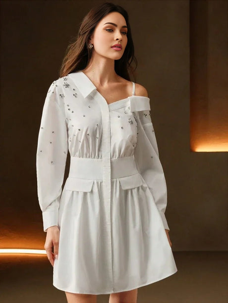 This elegant white dress features a stylish one-shoulder design and delicate embellishments, exuding a chic and.