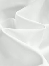 Experience elegance with this flowing white dress, crafted from a soft, lightweight fabric that drapes beautifully for a.