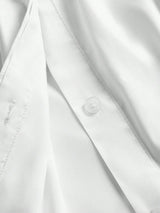 This elegant white dress features a sleek button-up design, showcasing a refined and polished look perfect for various.