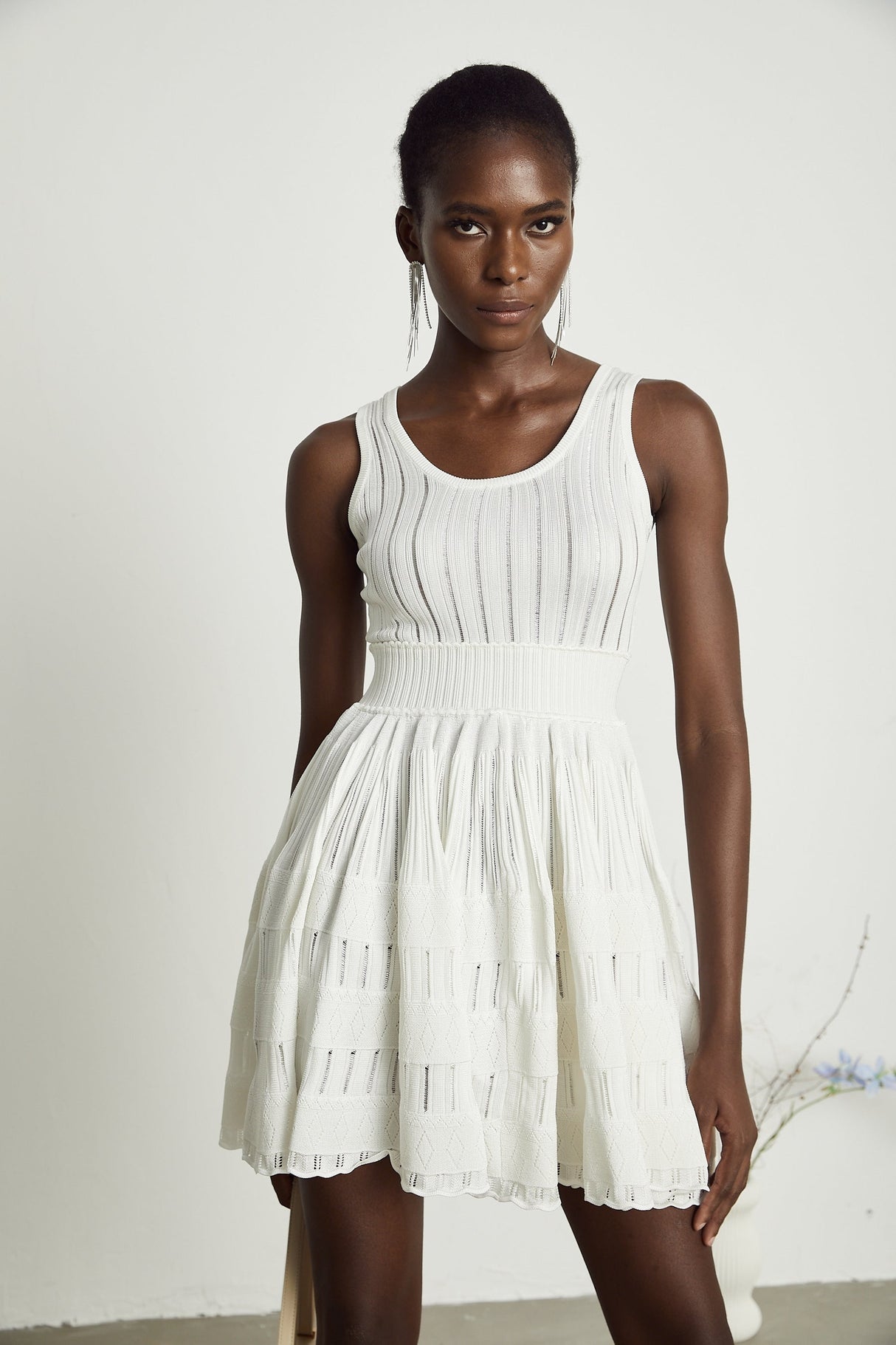 Noémie white cutout pleated mini dress
